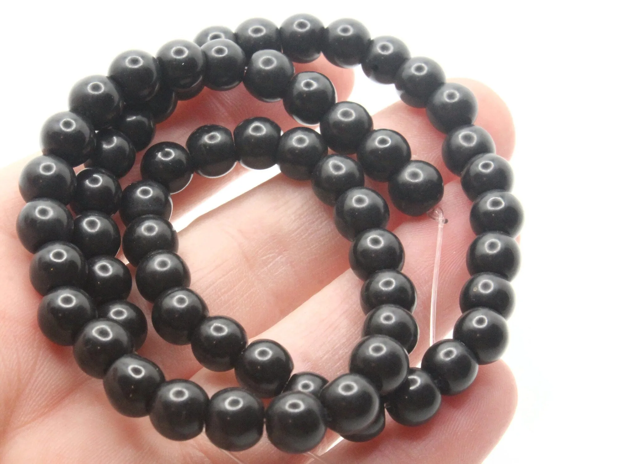 61 7mm Black Round Stone Beads