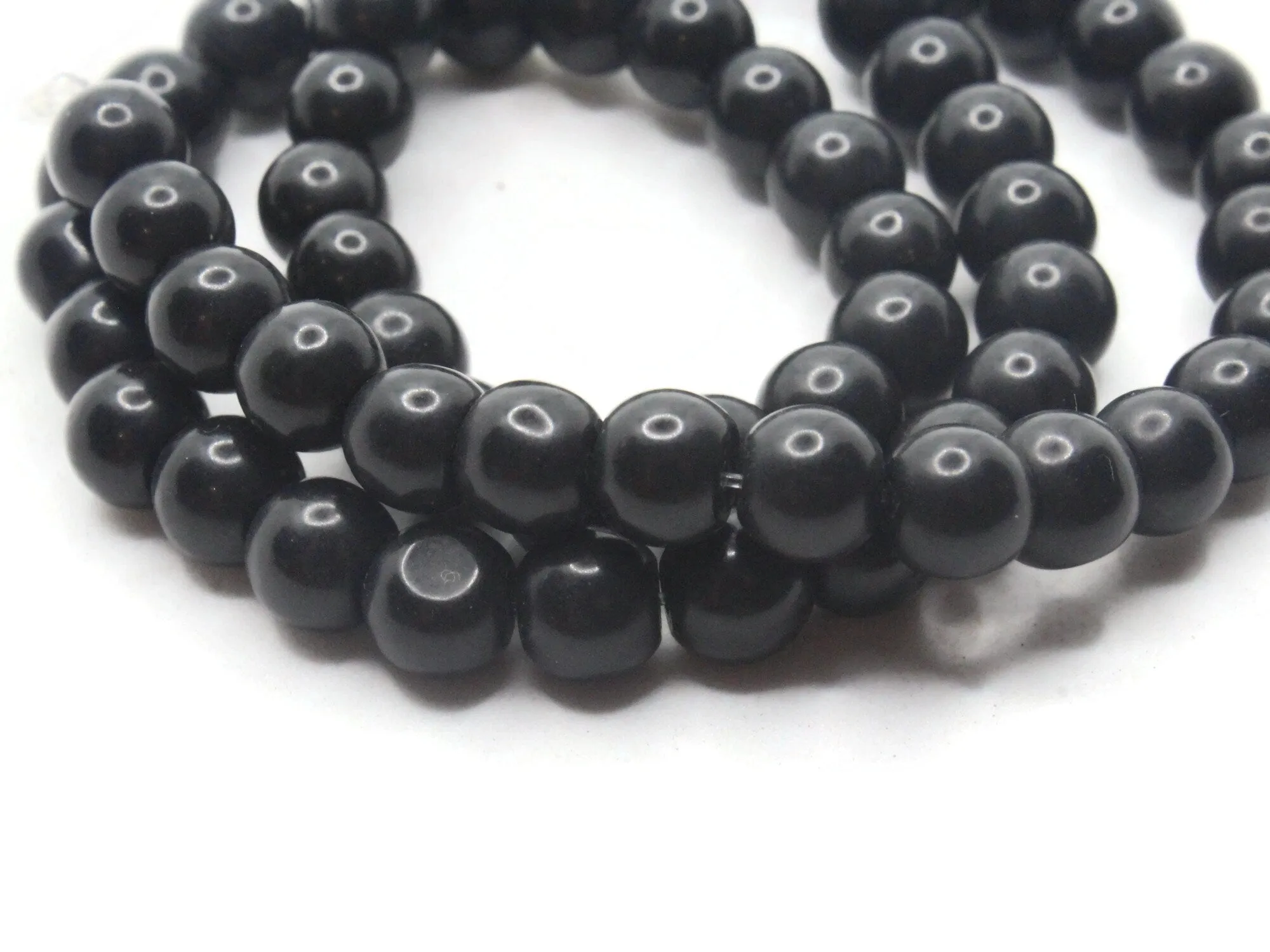 61 7mm Black Round Stone Beads