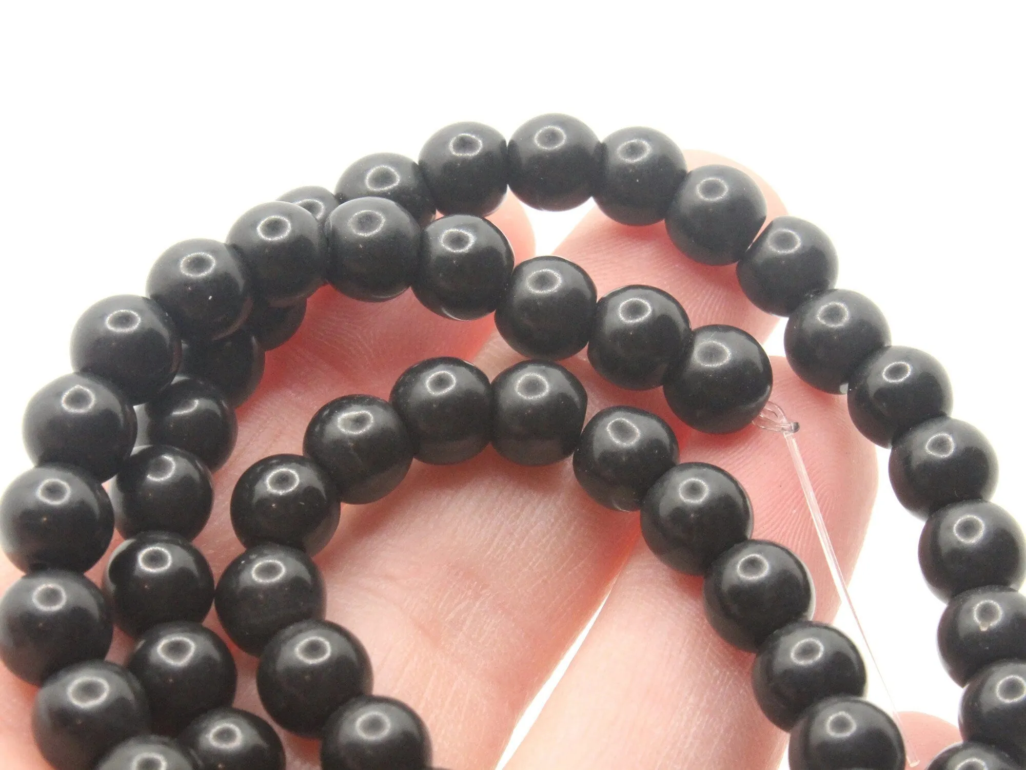 61 7mm Black Round Stone Beads