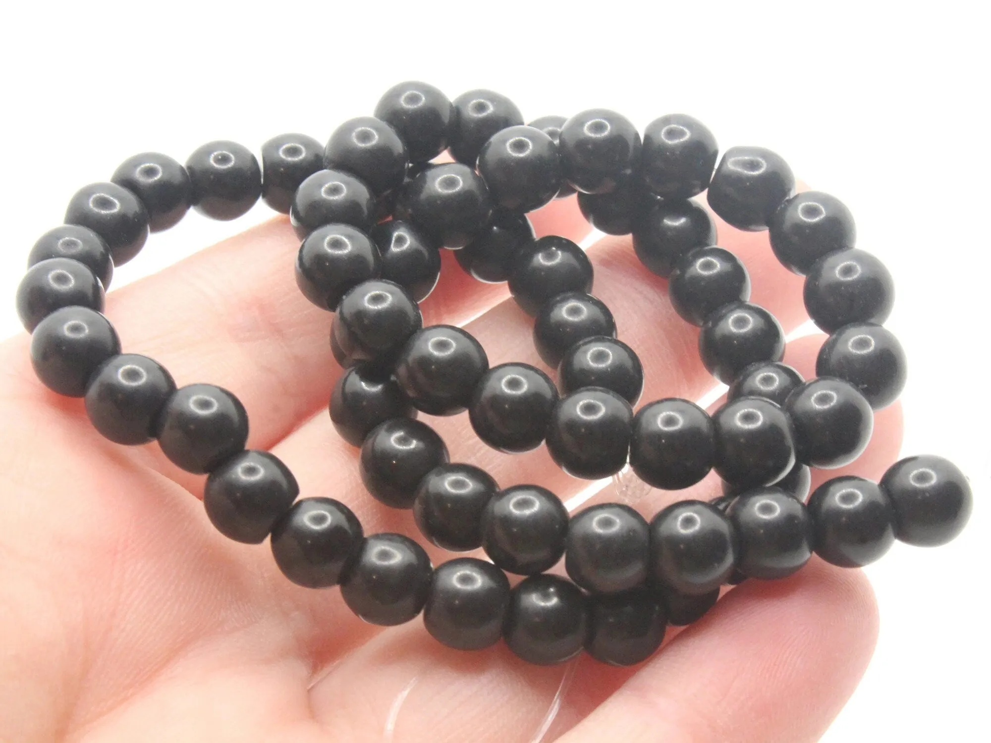 61 7mm Black Round Stone Beads