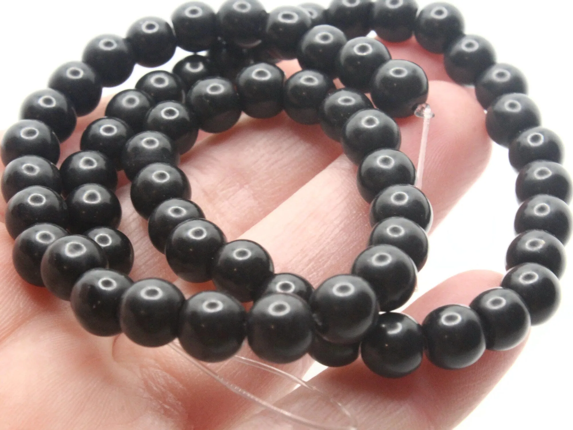 61 7mm Black Round Stone Beads