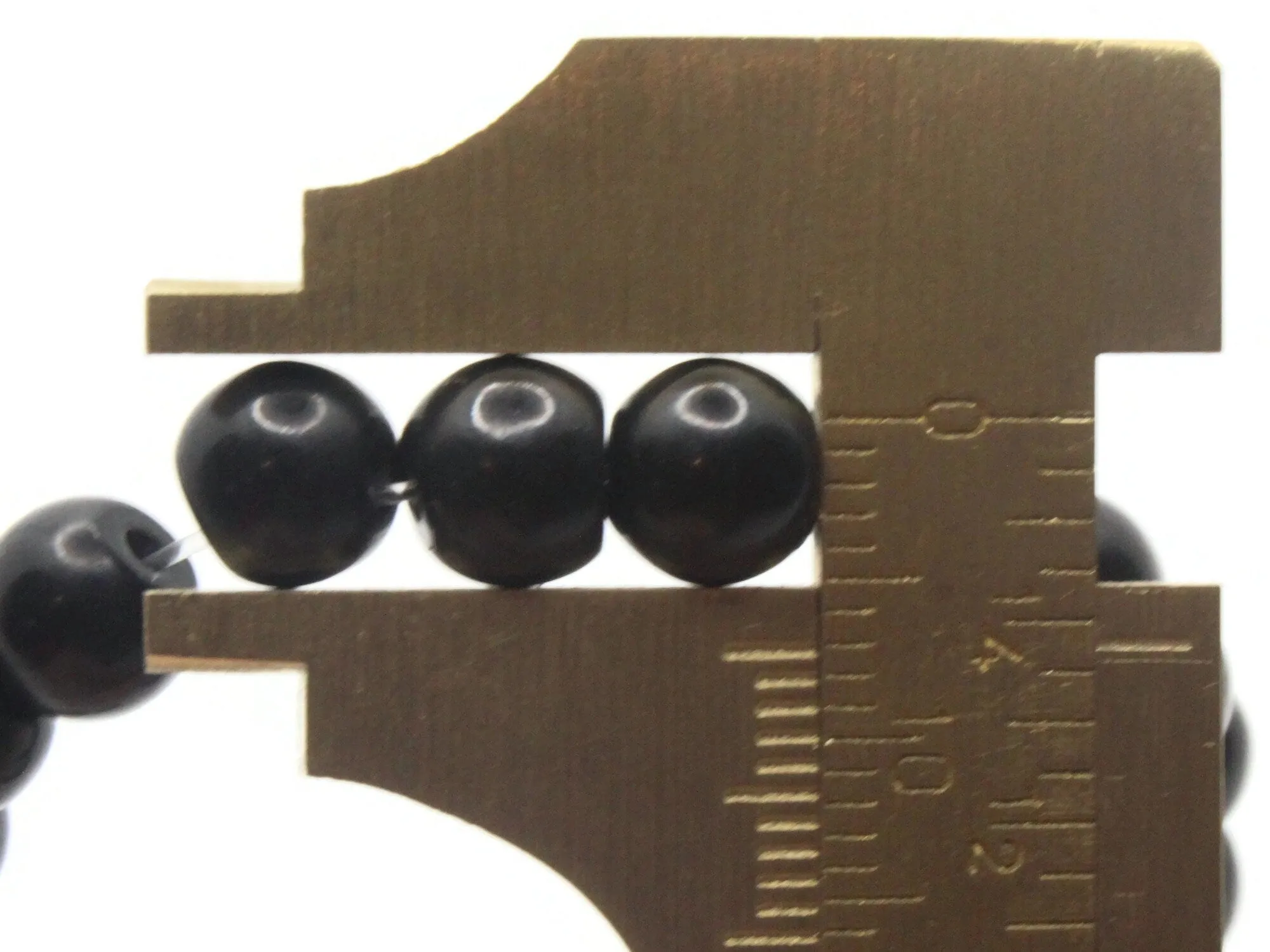 61 7mm Black Round Stone Beads