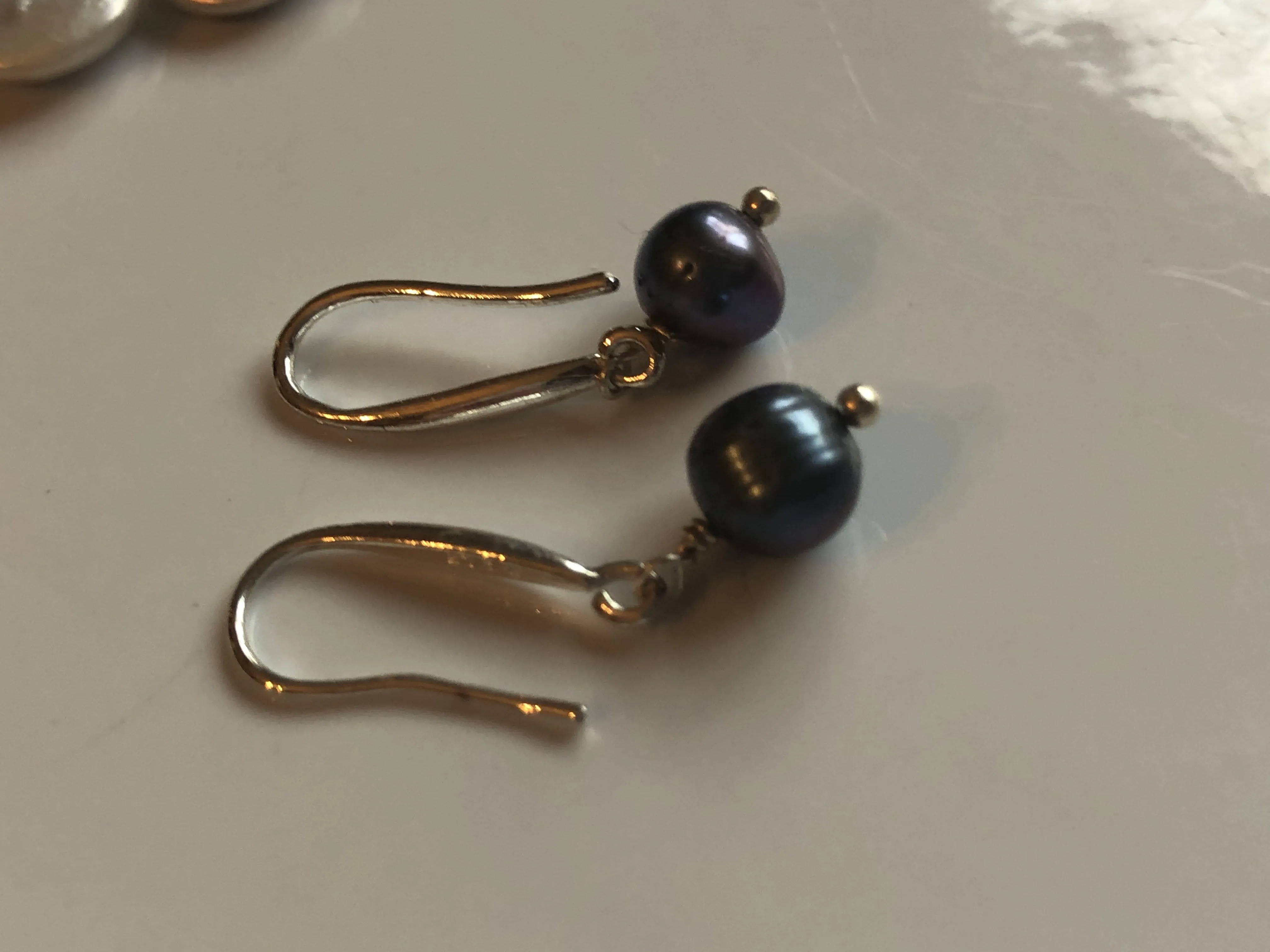 Earrings: Single peacock freshwaterpearl drop earrings