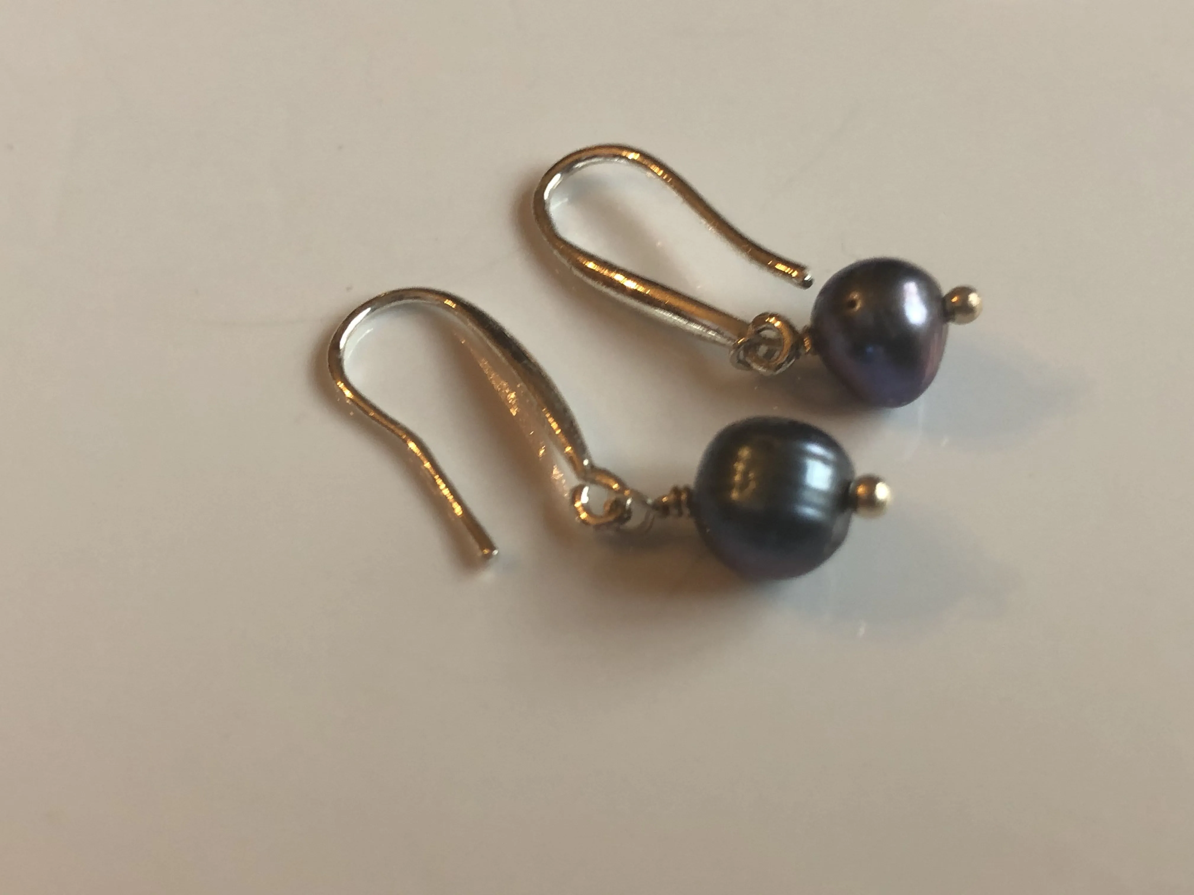 Earrings: Single peacock freshwaterpearl drop earrings