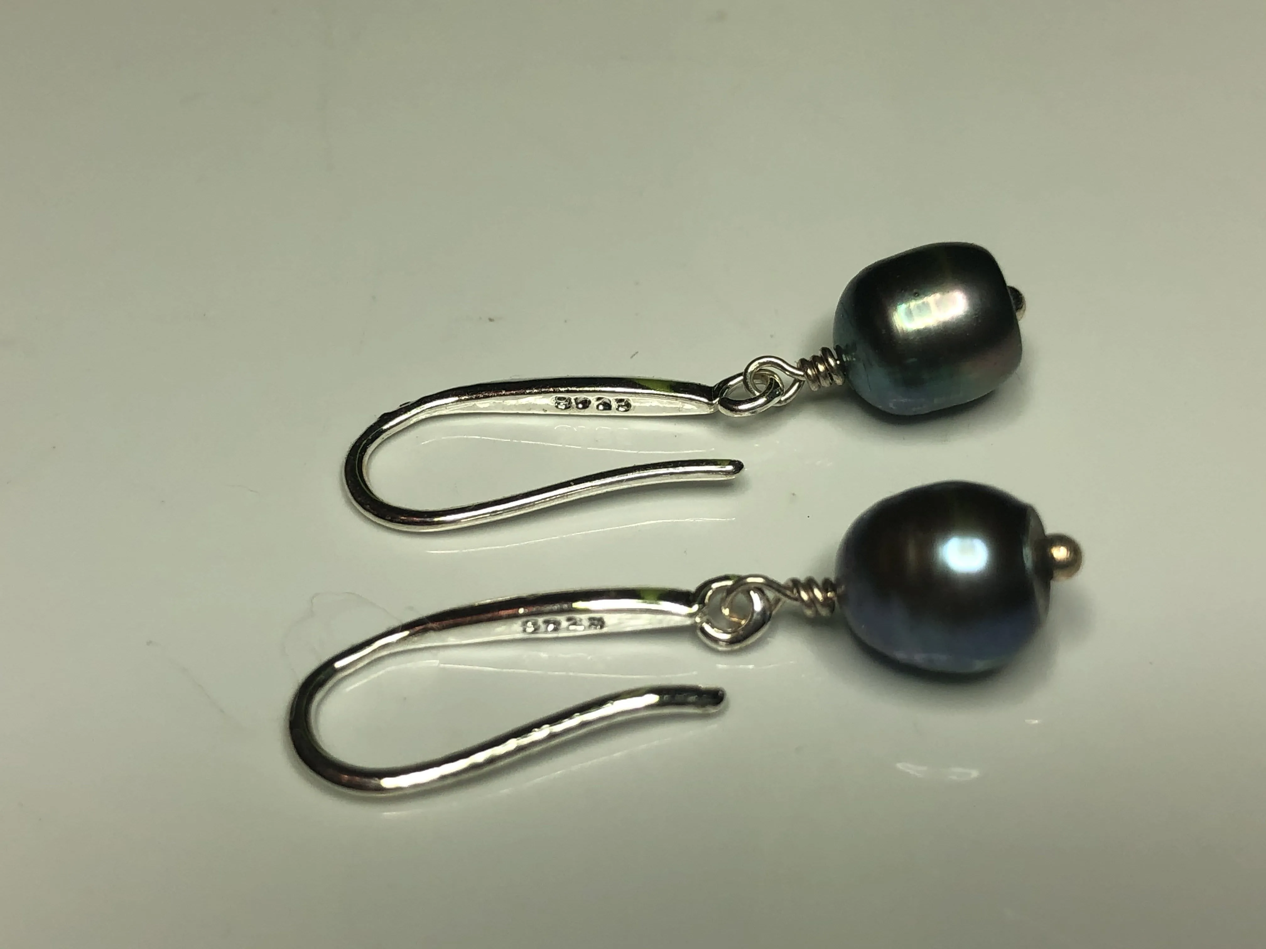 Earrings: Single peacock freshwaterpearl drop earrings