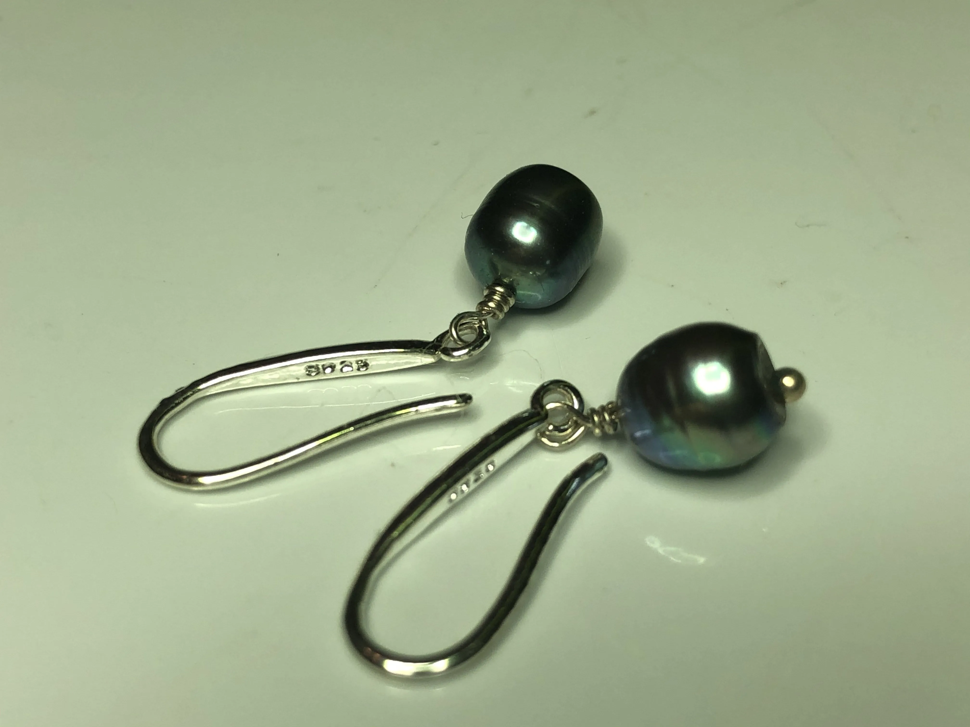 Earrings: Single peacock freshwaterpearl drop earrings