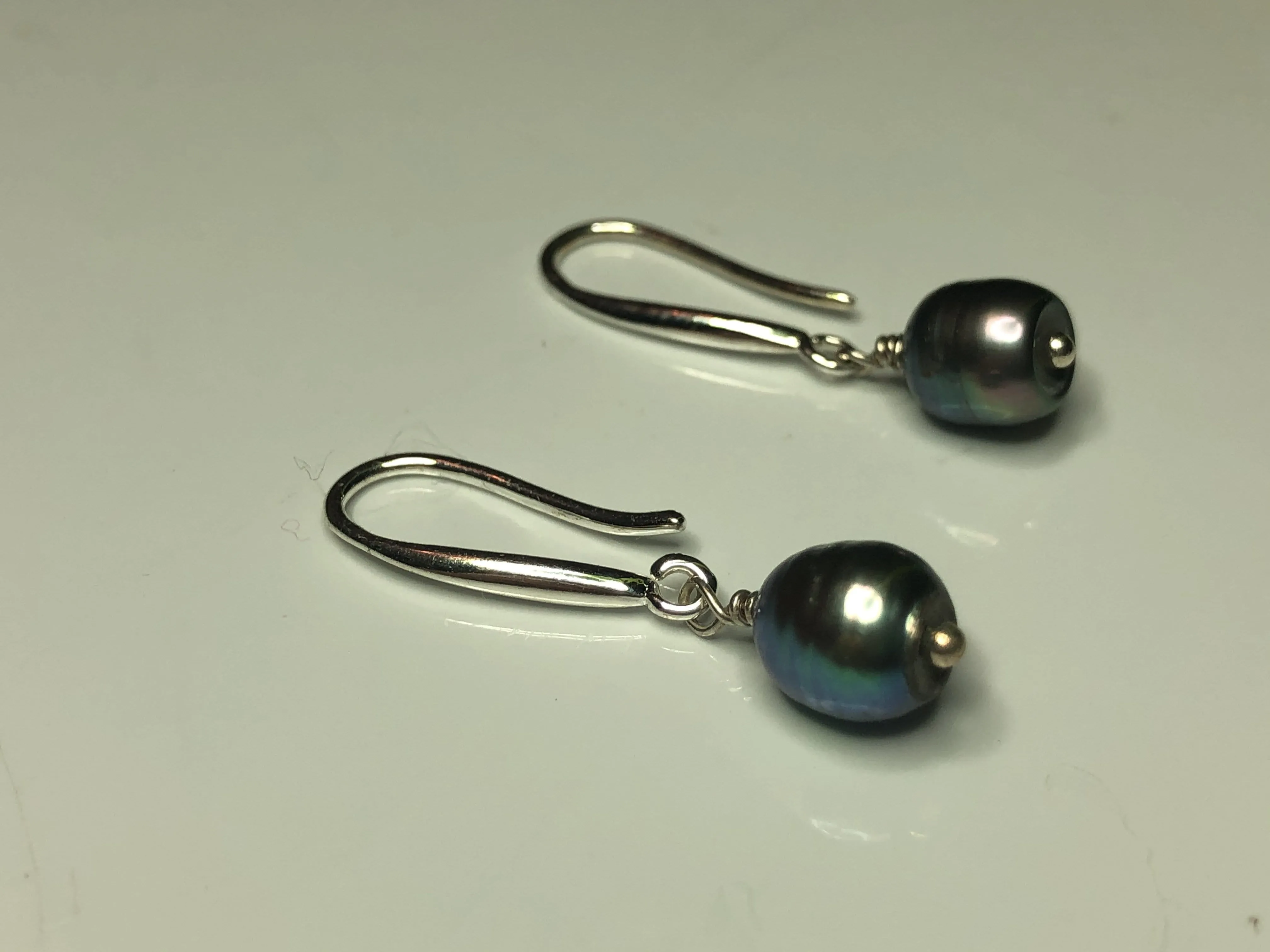Earrings: Single peacock freshwaterpearl drop earrings